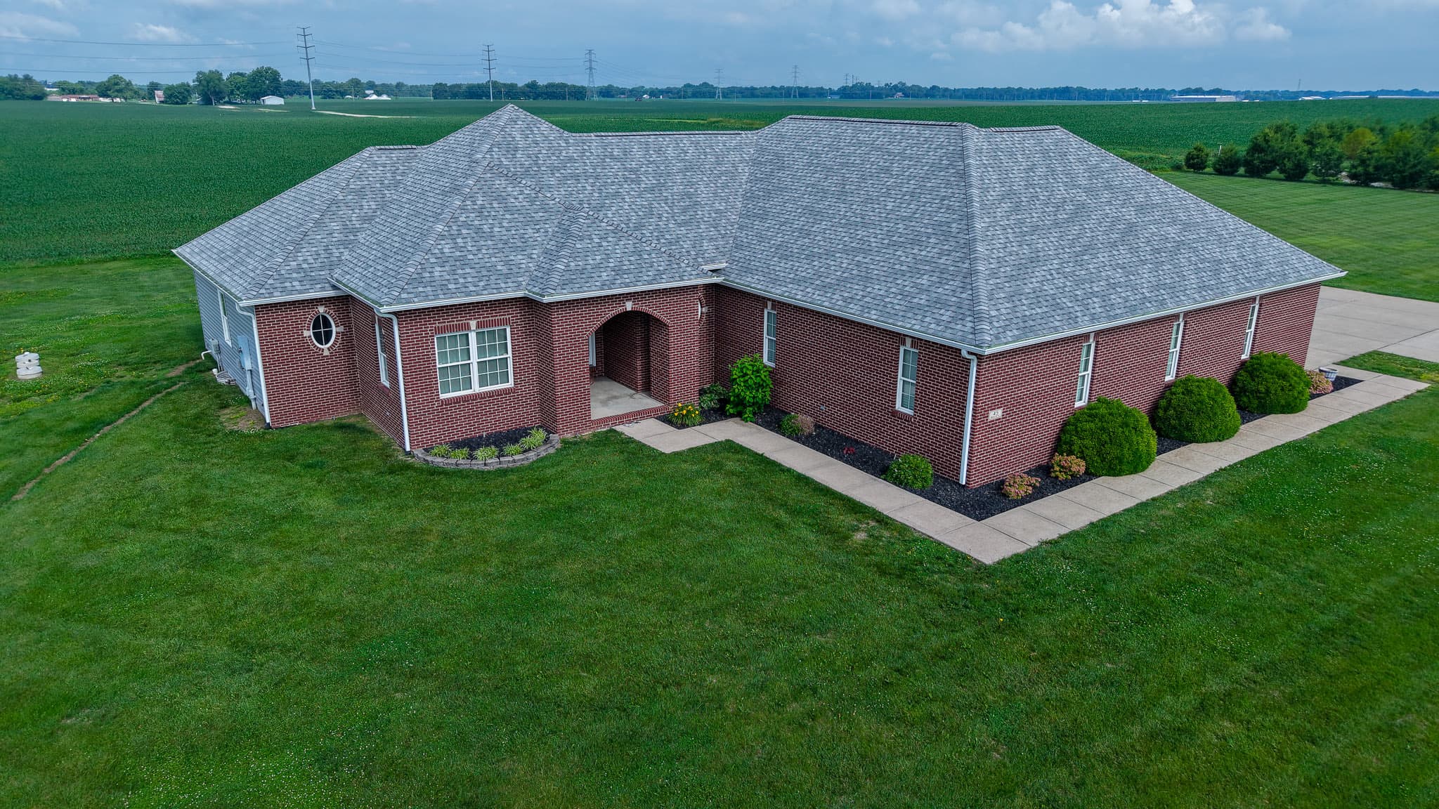 Aerial view of a completed H&F Exteriors roof replacement on a St. Louis home